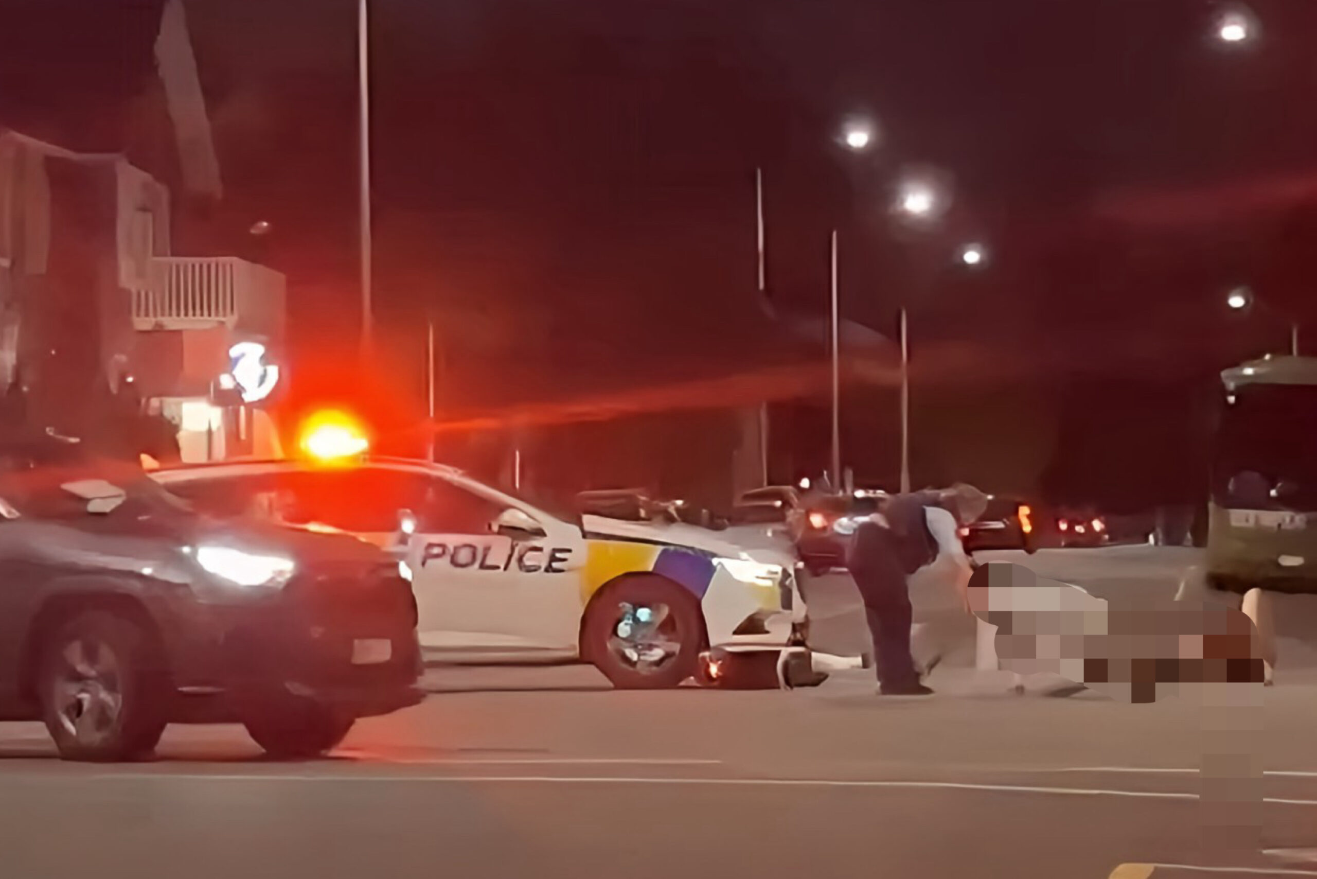 Two injured after running red light on e-scooter and crashing into police car