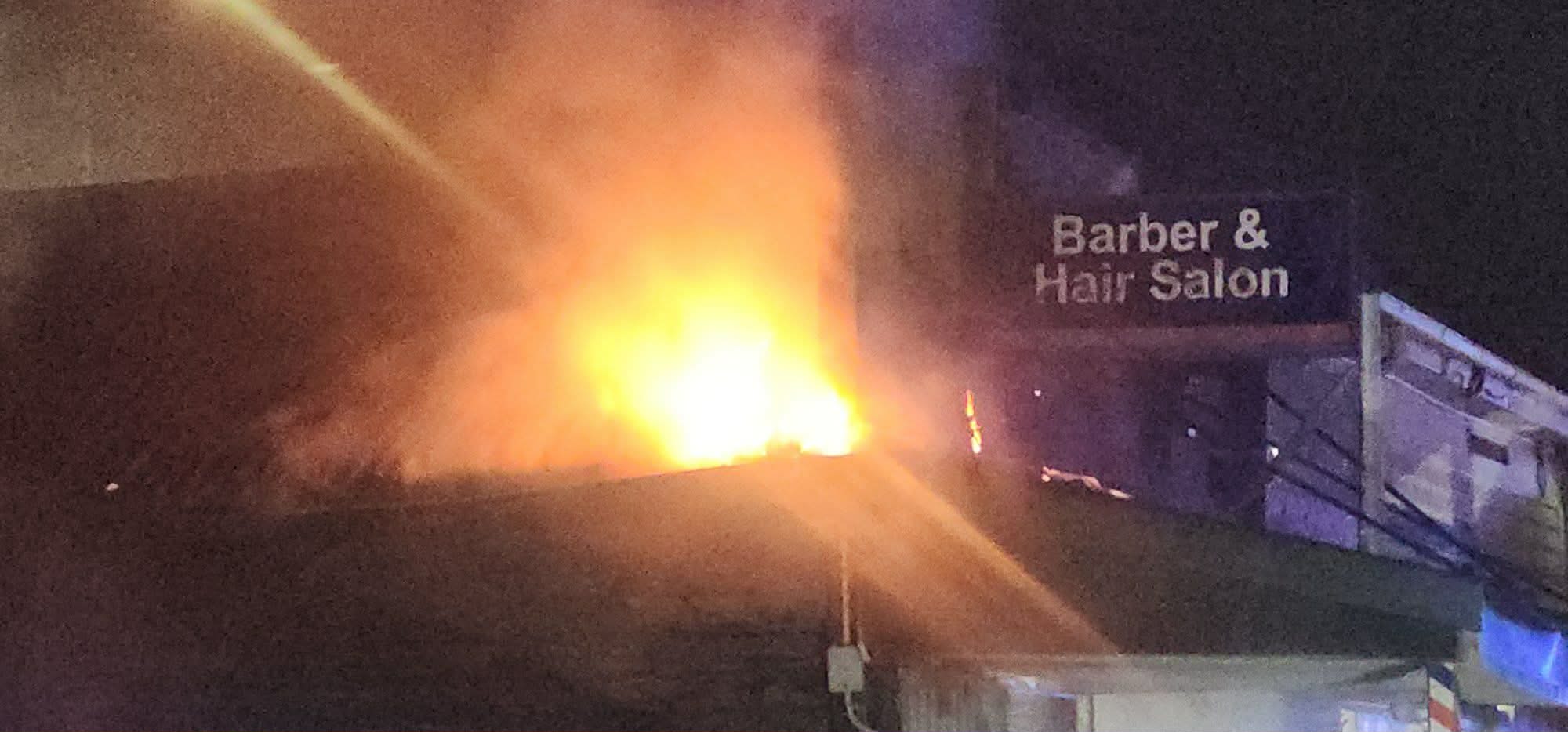 Fire crews battle blaze at shops in Linwood