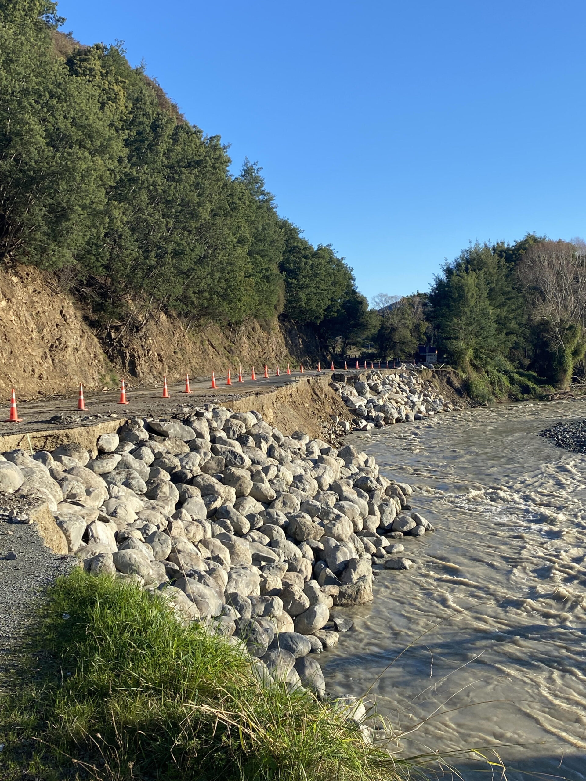 Photo / rock placed where chunks of SH1 were eaten away by floodwaters / NZTA 