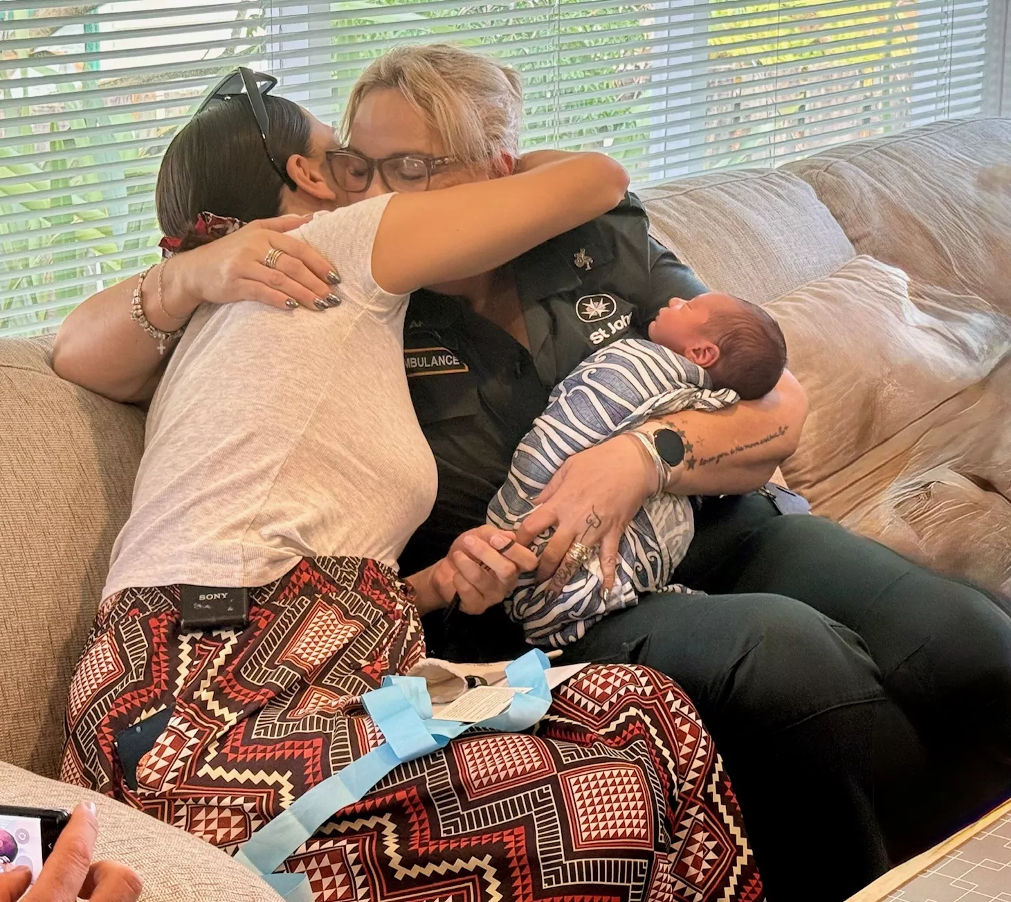 Emergency 111 call ends in bathroom birth and emotional reunion for St John call handler