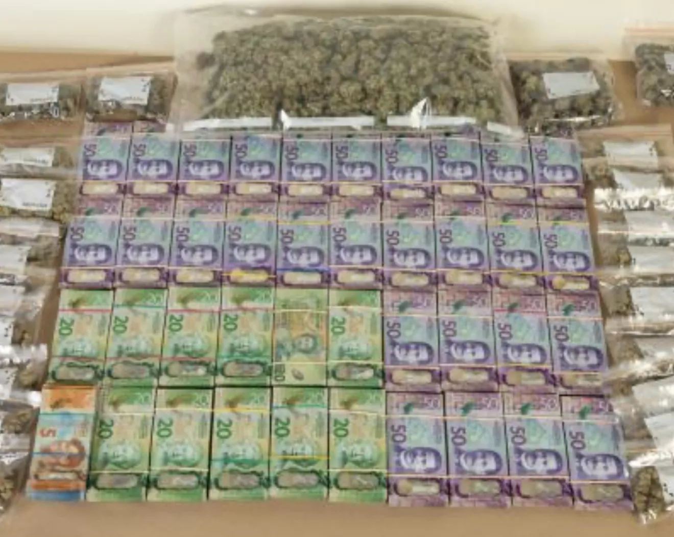 Six face drug charges after $61,000 cash seizure