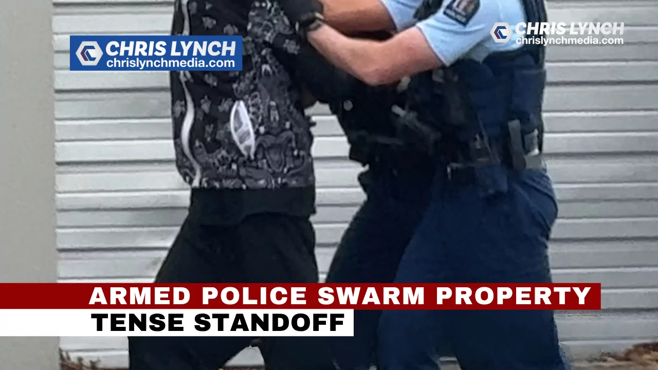 Armed police swarm Fitzgerald Avenue property
